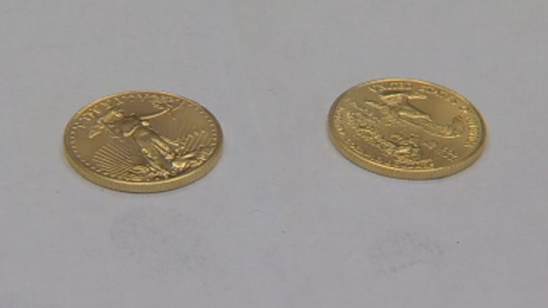 Donor drops gold coins in Salvation Army kettles